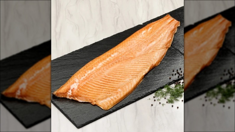 slab of smoked salmon on cutting board