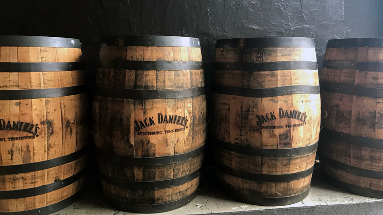 Several Jack Daniel's whiskey barrels 