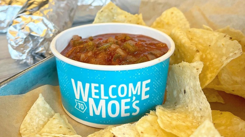 Moe's Southwest Grill salsa cup with chips