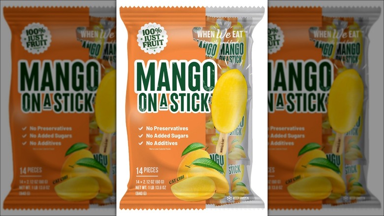 Bag of frozen mangoes on a stick.