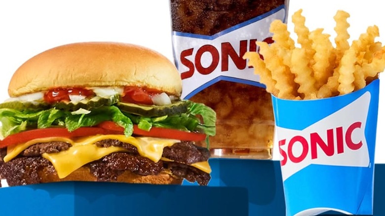 All-American Smasher burger with a soft drink and fries from Sonic