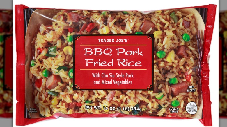 Bag of frozen Trader Joe's BBQ Pork Fried Rice against white background.