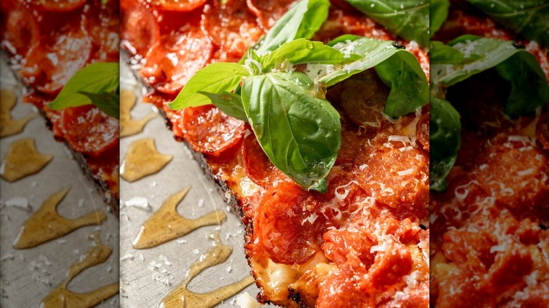 pizza with basil leaf