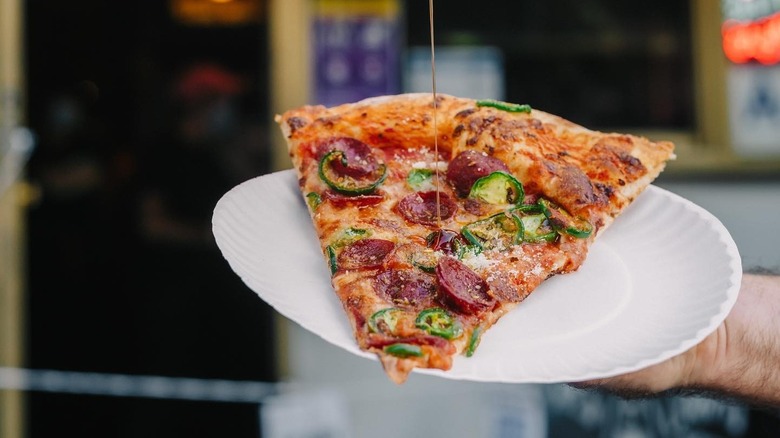pepperoni pizza with jalapeños and honey drizzling