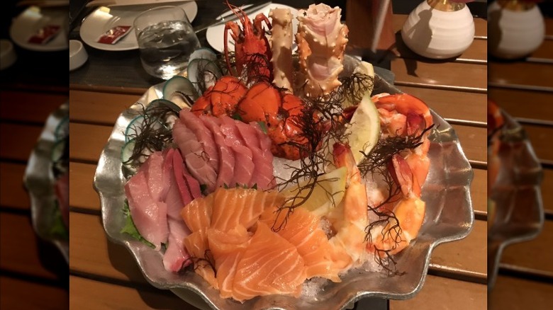 A seafood tower on a sliver platter