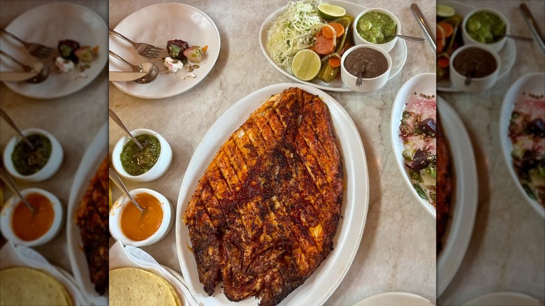 Table filled with food at Este restaurant in Austin, Texas