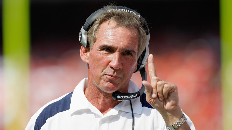 Mike Shanahan wearing headset while coaching the Denver Broncos