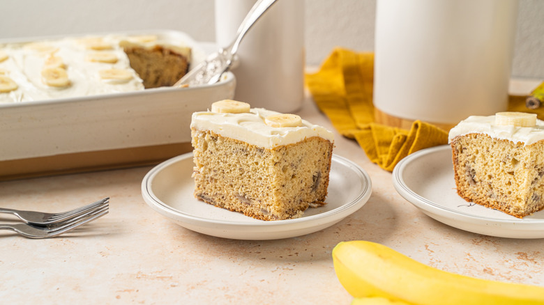 Banana cake slices on white plates