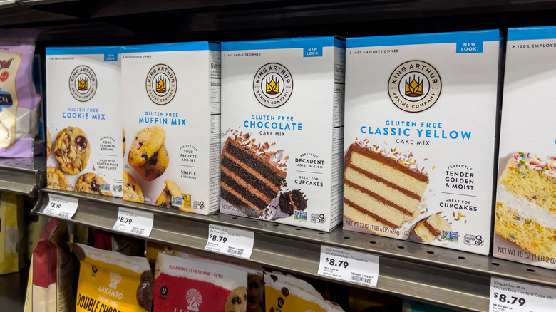 Boxes of King Arthur gluten free baking mixes on a store shelf