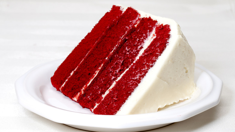 Red velvet cake slice on a white plate