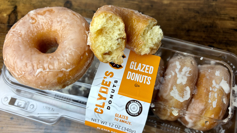 A container of Clyde's Donuts Glazed Donuts