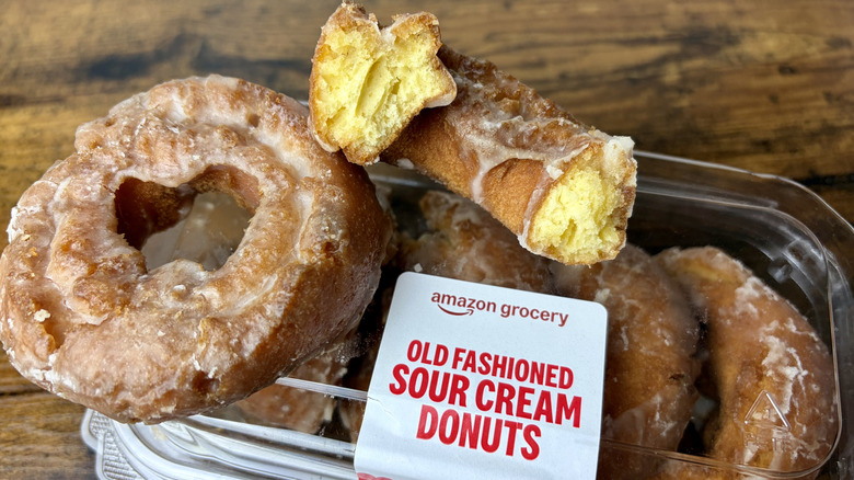 A container of Amazon Grocery Old Fashioned Sour Cream Donuts