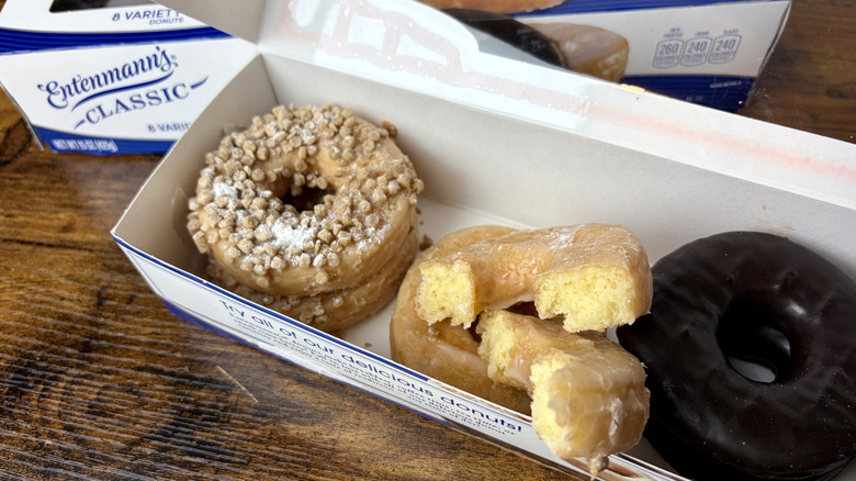 A box of Entenmann's Classic glazed, chocolate frosted, and crumb top variety pack donuts