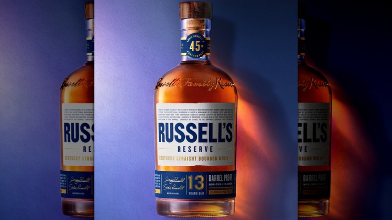 Bottle of Russell's Reserve 13-year-old on blue-purple background