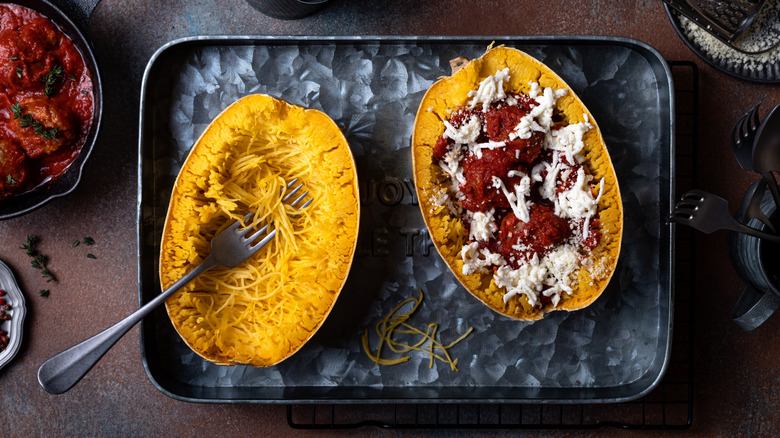 spaghetti squash on pan with sauce