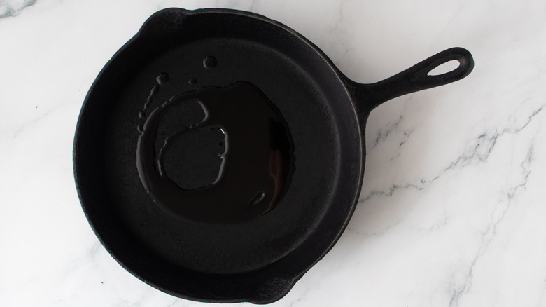 oil in a black frying pan