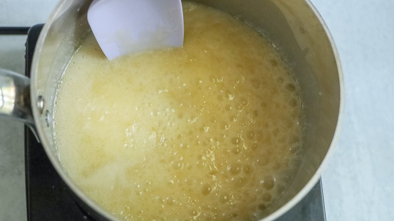 Butter mixture bubbling in saucepan