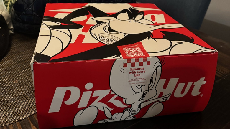 Pizza Hut delivery box with Space Jam characters