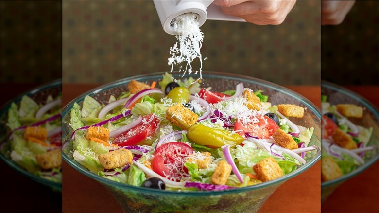 Olive Garden salad with parmesan grinder