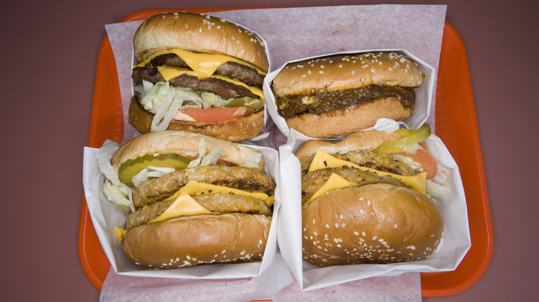 Four burgers red tray