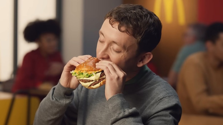 Man biting into a Big Arch