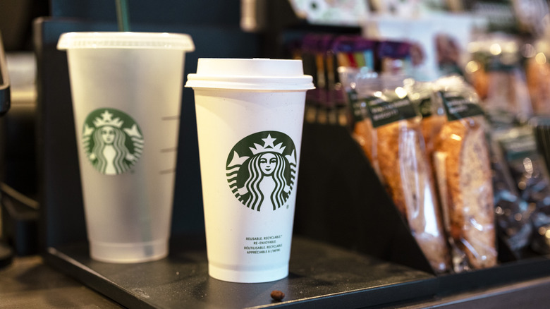 Starbucks cups at register 