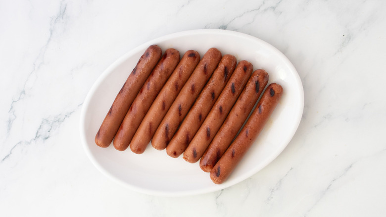 Grilled hot dogs on plate
