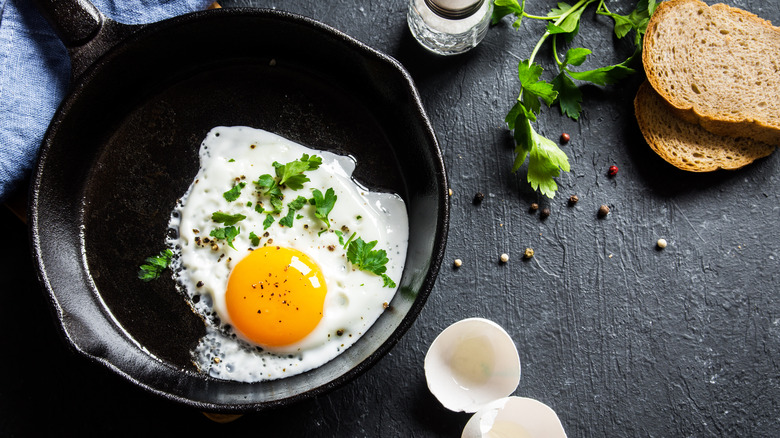 fried egg in cast iron pan