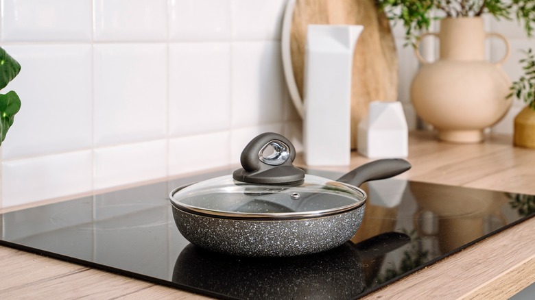 pan on top of stove with lid