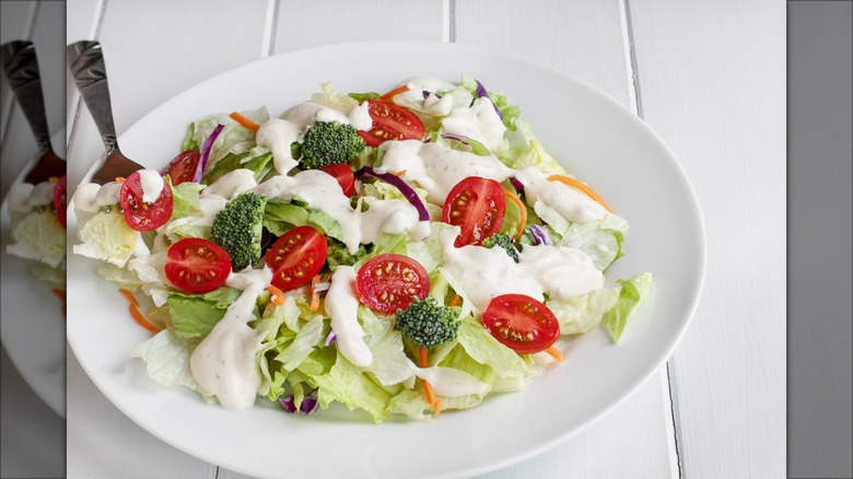 Plate of salad with ranch dressing