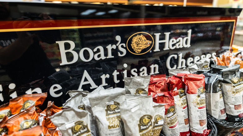 A Boar's Head sign in a supermarket
