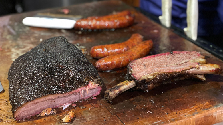 Smoked sausages, ribs, and beef brisket