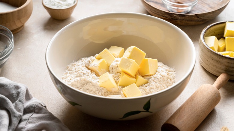 Cubed butter in flour
