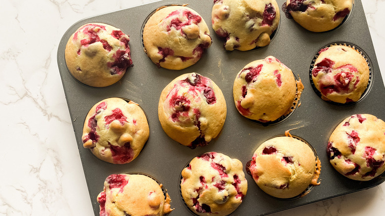 cranberry muffins in pan
