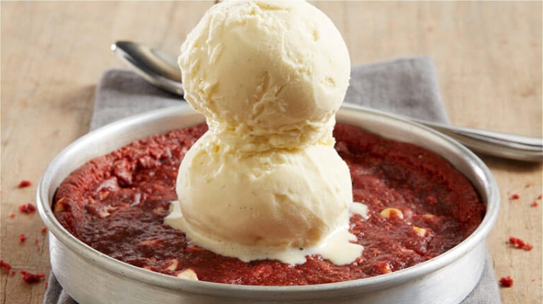 Red Velvet Pizookie on brown table