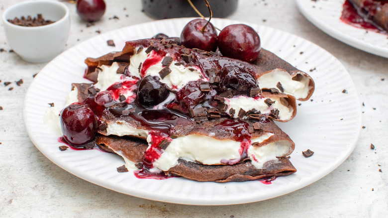 black forest chocolate crepes on plate