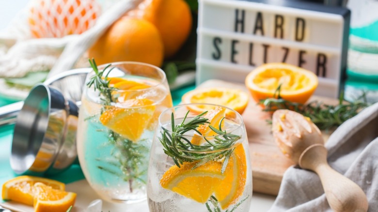 Hard Seltzer sign with drinks