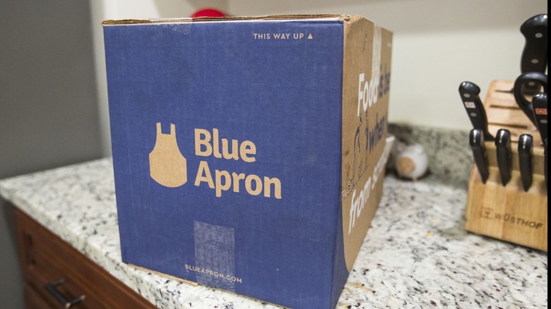 Blue Apron box sitting on kitchen counter