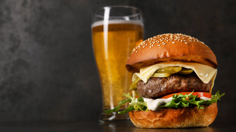 Cheeseburger and glass of beer