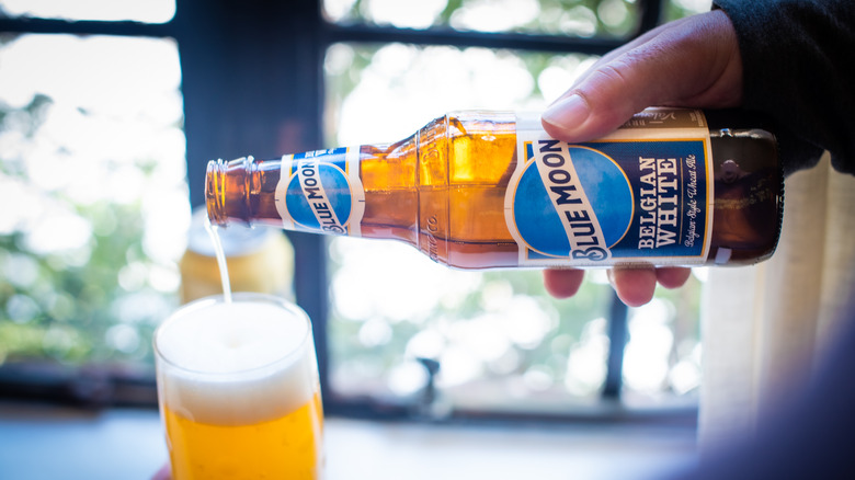 Blue Moon being poured in a glass