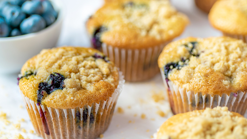 blueberry muffins on display