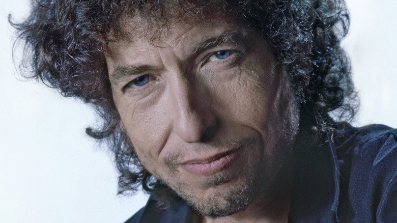 Bob Dylan wearing a dark blue shirt