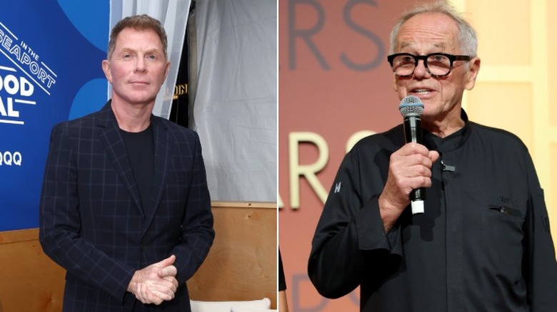 Bobby Flay clasping his hands together on the left in front of food festival sign and Wolfgang Puck on the right holding a microphone