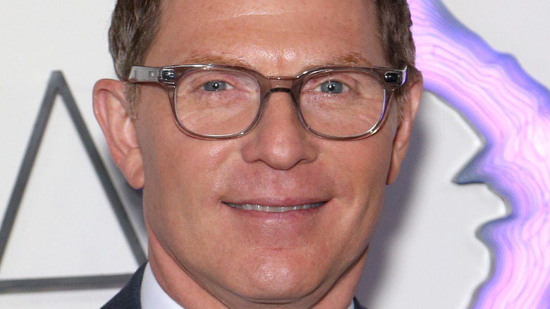 Bobby Flay smiling in glasses