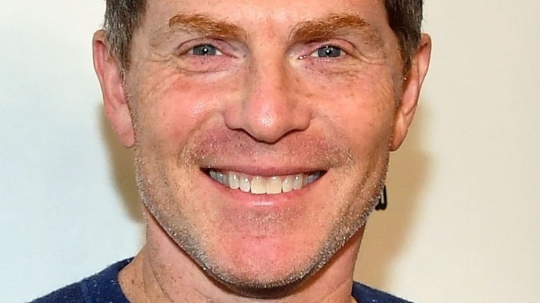 close up of bobby flay with wide smile