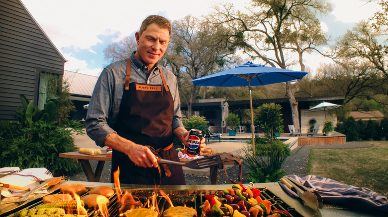Bobby Flay grilling with Pepsi