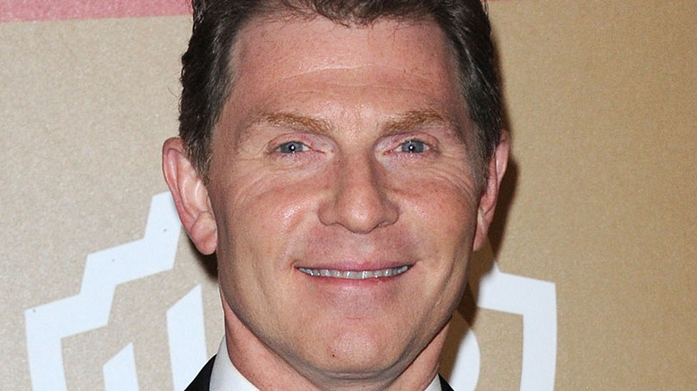 Bobby Flay smiling at event 