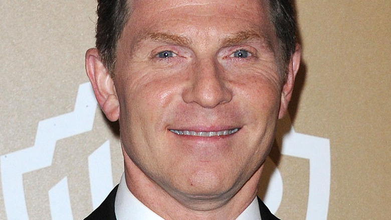 bobby flay smiling in suit