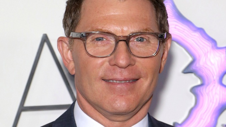 Bobby Flay smiling in glasses