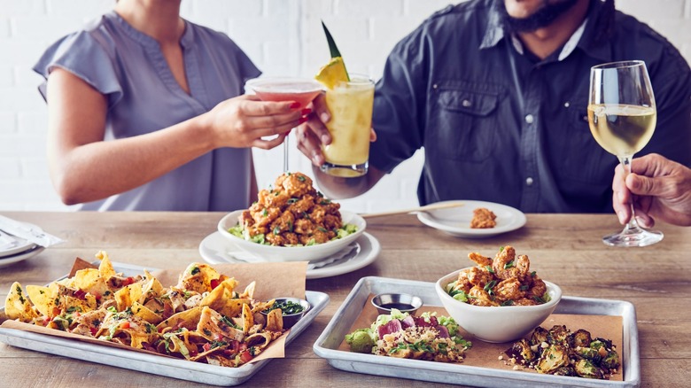 people cheers at Bonefish Grill